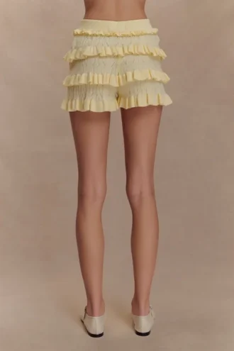 Amy Pointelle-stickade byxor med volanger – Lemon