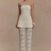 Anette bandage-stickad axelbandslös topp – elfenben