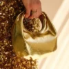 Bristol Mini Croissant läderväska – guld Bristol Mini Croissant läderväska – guld
