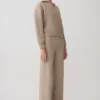 Evan stickade byxor med vida ben – beige melerad Evan stickade byxor med vida ben – beige melerad