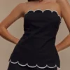Judith strapless topp med vågig kant – svart Judith strapless topp med vågig kant – svart