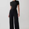 Junie kortärmad bodysuit med korsad överdel – svart Junie kortärmad bodysuit med korsad överdel – svart
