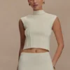 Romaine höghalsad bandagestrickad topp – elfenben Romaine höghalsad bandagestrickad topp – elfenben