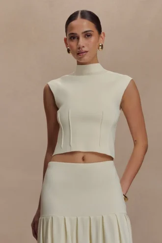 Romaine höghalsad bandagestrickad topp – elfenben