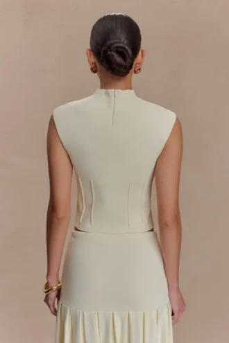 Romaine höghalsad bandagestrickad topp – elfenben