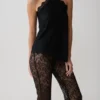 Theodosia asymmetrisk halterneck-top i spets – svart